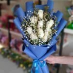 White Imported Flowers with Blue Theme in Multan for Fathers Day
